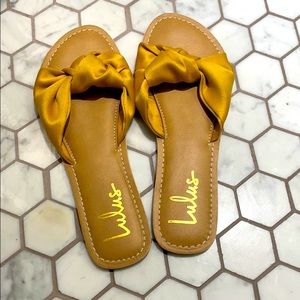 Yellow knot slide sandals